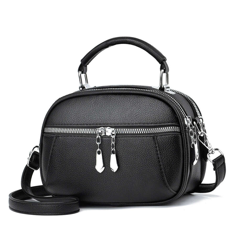 New handbag simple shoulder small round casual women s bag mother