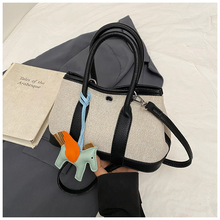 Advanced and fashionable hand-held bucket for women in spring 2025 versatile tote bag popular crossbody bag