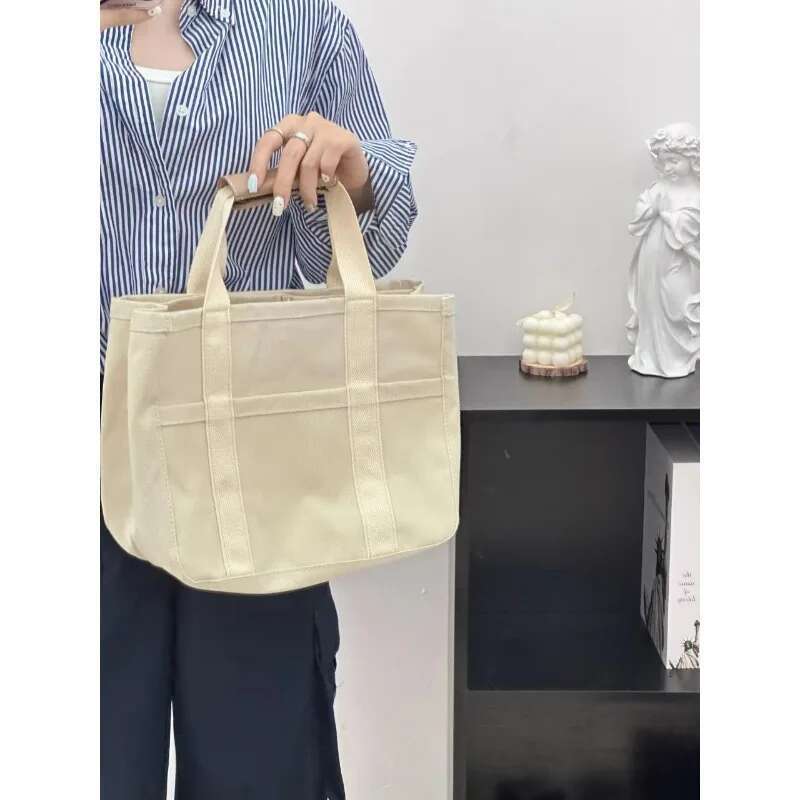 Fashionable multi-functional single-shoulder crossbody for and baby, hand-held canvas baby stroller, mother bag