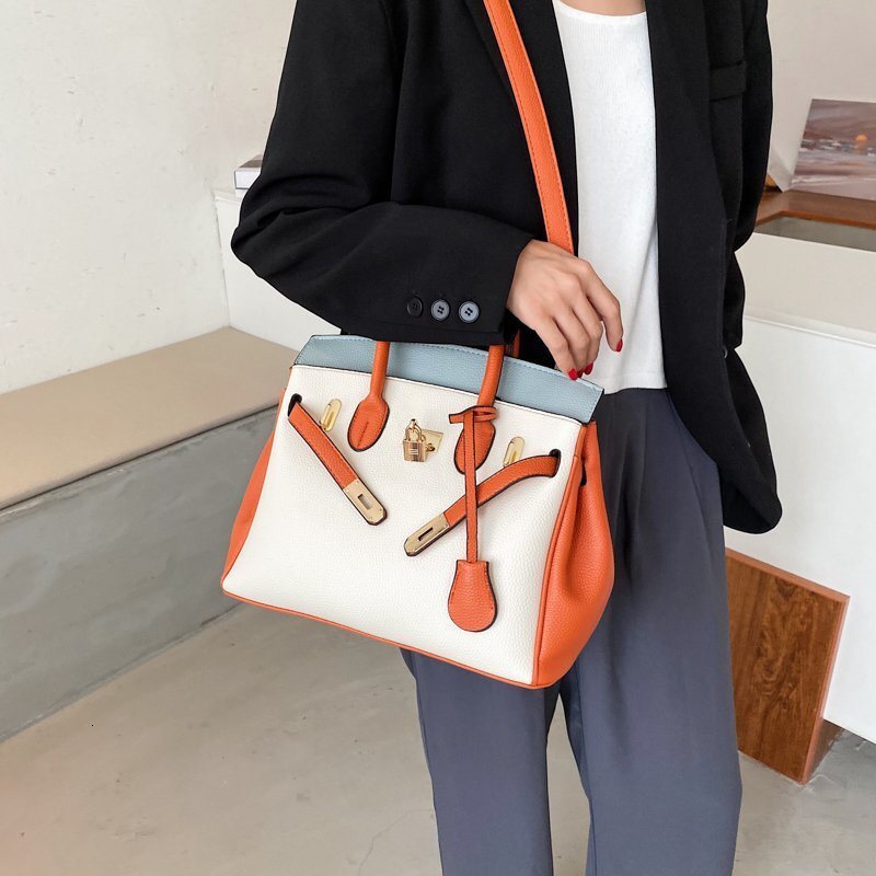 2025 Designer Large Capacity Lychee Pattern Contrasting Color Single Shoulder Crossbody Bag for Fashionable and Casual Women