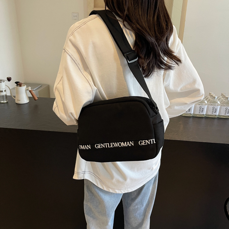 Casual letter diagonal canvas for women 2025 new Gentlewoman simple and fashionable handbag shoulder bag