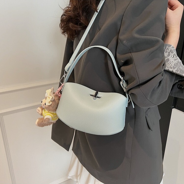 Free Shipping Designer Bag 2025 Spring/summer Women's High End Handbag Fashion Leisure Niche New Multi Functional Shoulder Crossbody Bag Work Pil