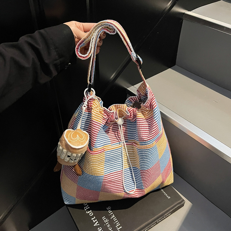 Fashionable large capacity underarm trendy spring new women's single shoulder crossbody bag striped grid fresh bucket casual dopamine knitted fab