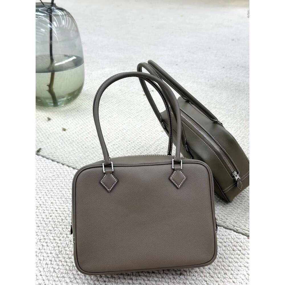 Steel hardware semi handmade Plume feather toe cover layer cowhide used box commuting hand held genuine leather women s bag