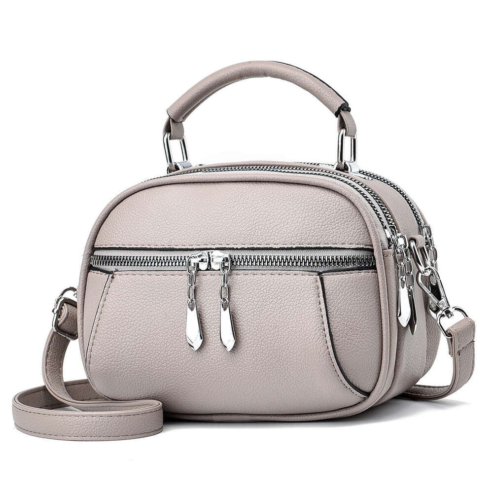 New handbag simple shoulder small round casual women s bag mother