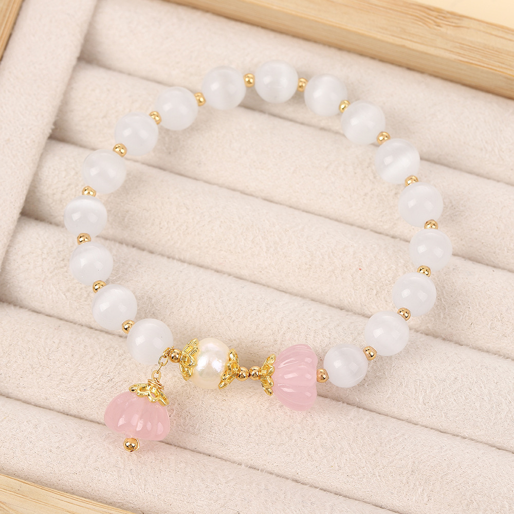 Chinese Ins Sakura Pink Pendant with a Unique Design, Crystal White Cat Eye Lotus Pong Women's Bracelet