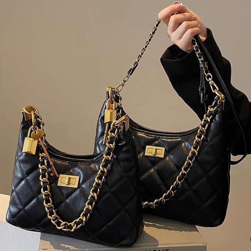 Xiaoxiangfeng Ling grid chain small women's 2025 new niche Black style shoulder crossbody wandering bag