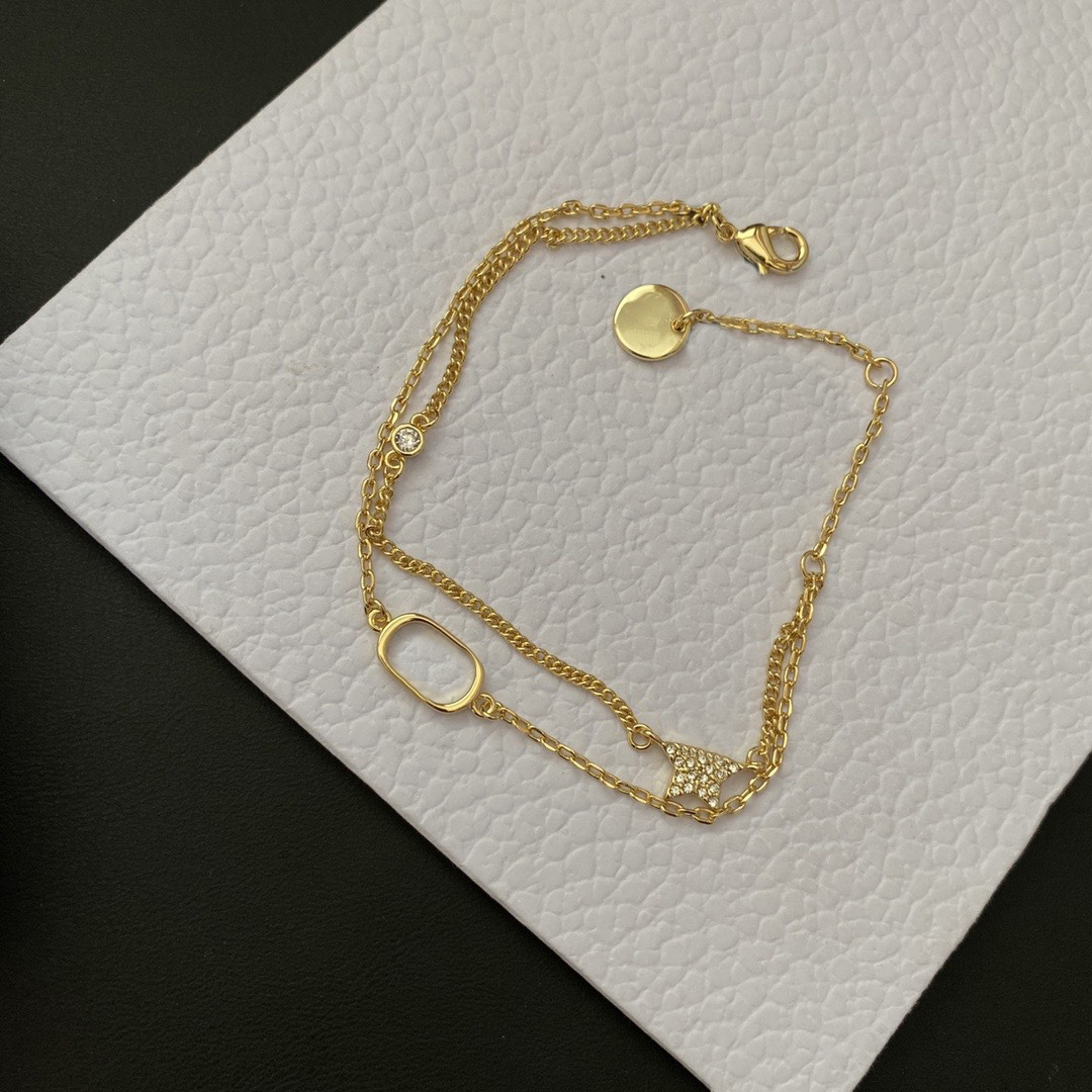 Designer Gold Tone Geometric Charm Bracelet Women's Fashion Jewelry Piece Chic and Trendy Accessory for Everyday Wear