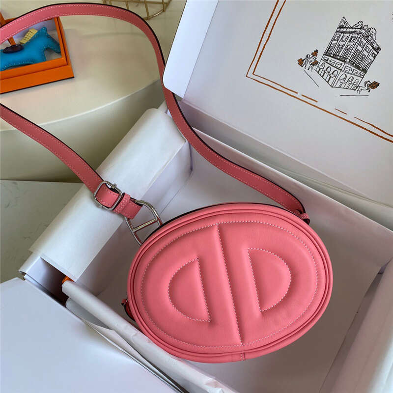 Swift cowhide nose new oval shaped mobile phone one shoulder crossbody chest bag genuine leather female pig