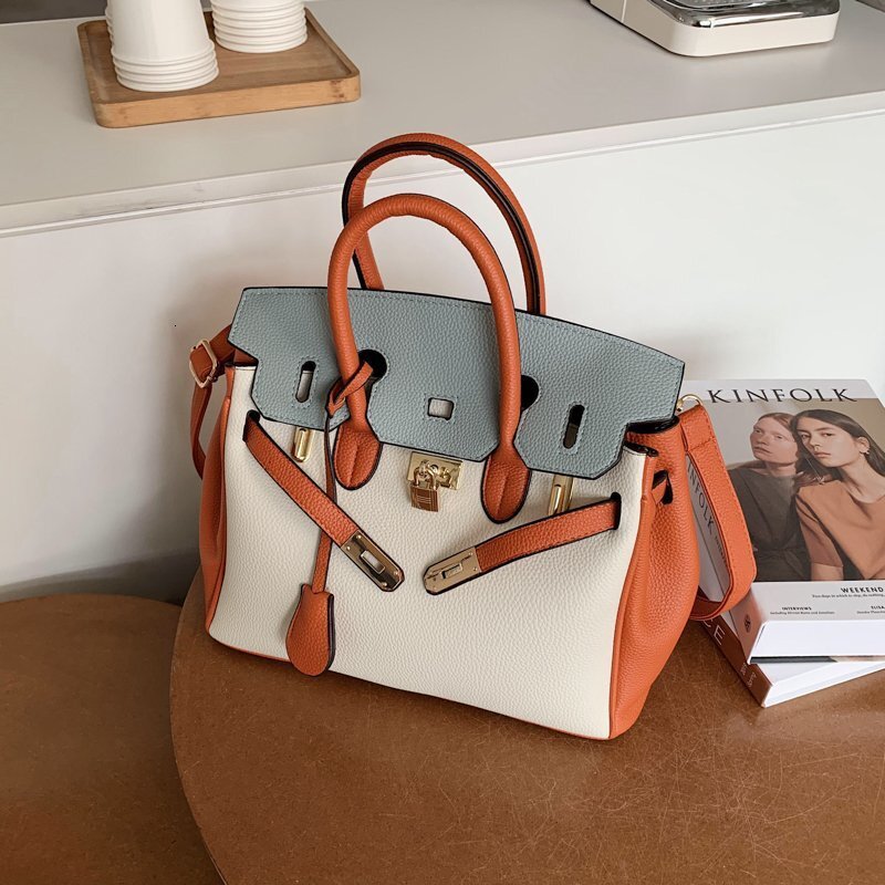 2025 Designer Large Capacity Lychee Pattern Contrasting Color Single Shoulder Crossbody Bag for Fashionable and Casual Women