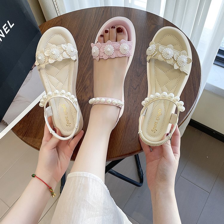 Free shipping Designer's new fairy-style flat fashion sandals for women in Summer 2025. The pearl flower round-toe thick-soled sandals look super