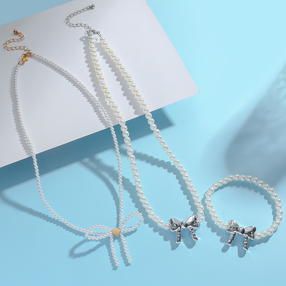 New bow pearl necklace, fashionable collarbone chain, high-end artistic niche set, bracelet accessories