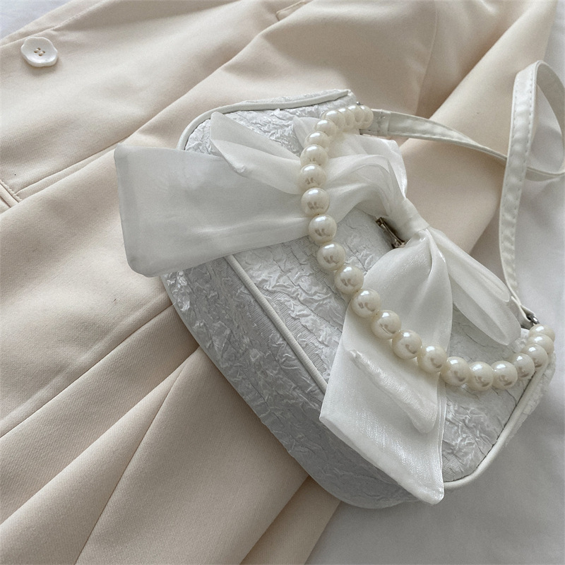 Top Quality Brand New Fashionable Western Bow Handheld Pearl Fashion Cross border Small Summer Popular Women's Shoulder Bag Free Delivery Designe