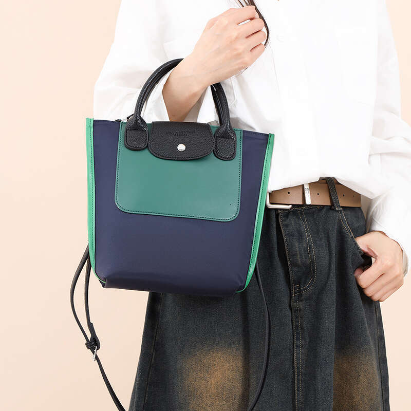 New Hot Hot Fashionable Handheld Women's Versatile Splicing Color Contrasting Tote Temperament Commuter Soft Leather Single Shoulder Crossbody Ba