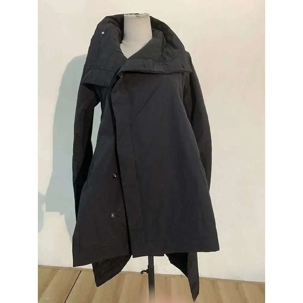 EAM 2024 New Fashion Winter Stand Collar Irregular Long Type Cotton-Padded Clothes Loose Coat Black Jacket Woman Ya771 Designer