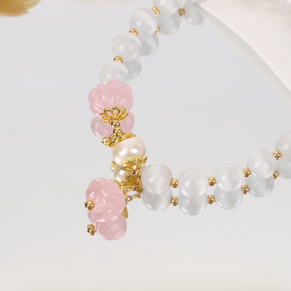 Chinese Ins Sakura Pink Pendant with a Unique Design, Crystal White Cat Eye Lotus Pong Women's Bracelet