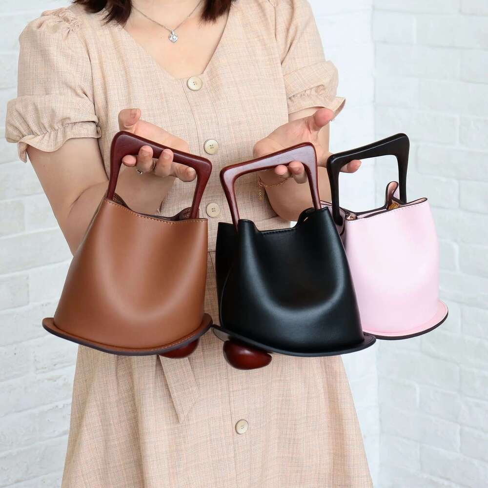 2025 Cowhide Leather Women's Brand Basket Bag Large Capacity Commuter Bucket Purses And Handbags