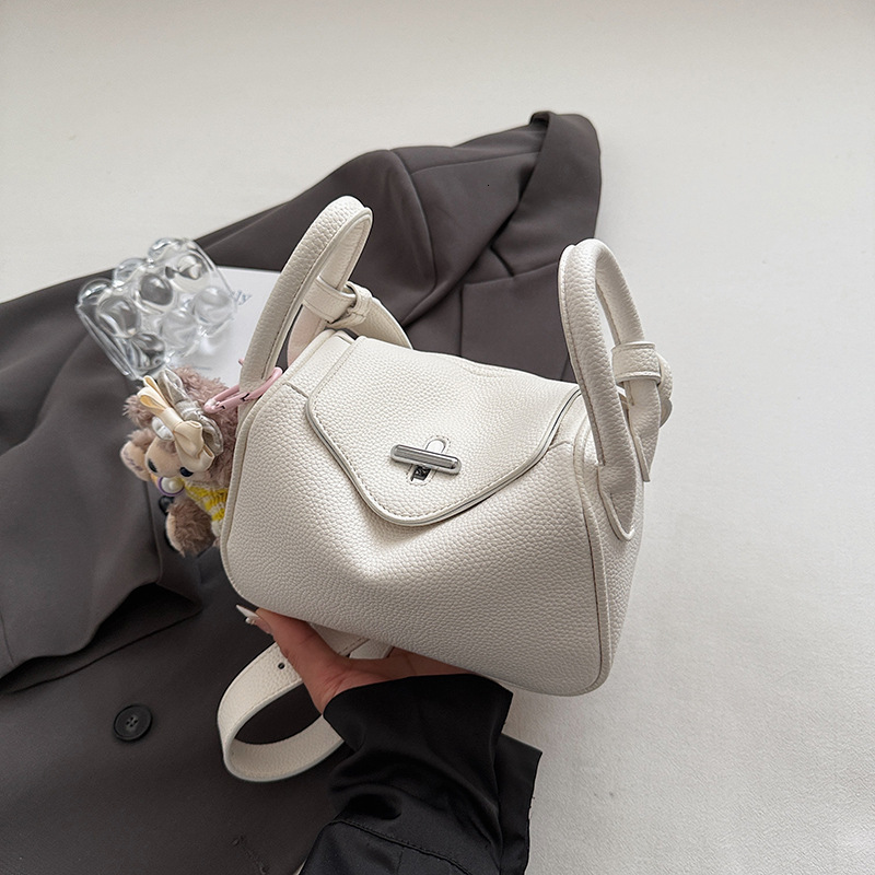 High end lychee patterned fashionable hand-held for women 2025 new trend versatile and stylish light luxury single shoulder crossbody bag