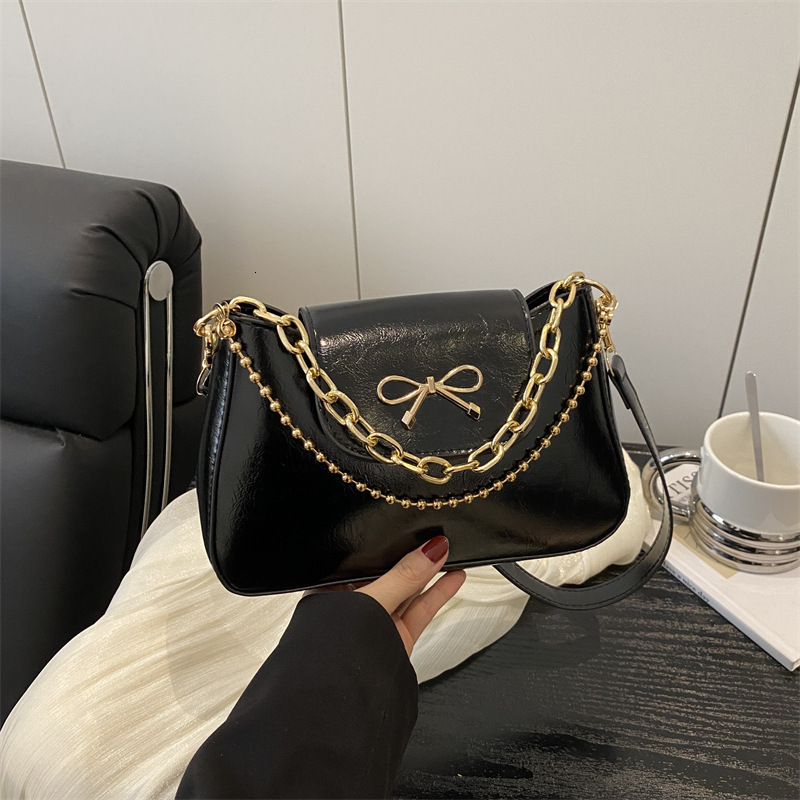 Free Delivery Designer Bag Korean Single Shoulder Chain Hand 2025 Spring New Simple And Versatile Commuting With Bow Decoration Crossbody Luxury