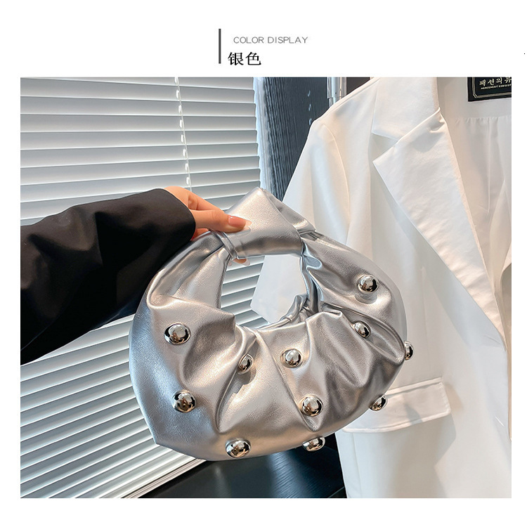 2025 new women's Korean version rivet personality fashion niche shoulder internet famous crossbody armpit bag