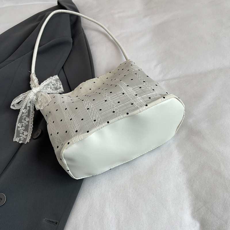 Super popular niche polka dot women's new fashionable multifunctional single shoulder underarm bag, trend lightweight and simple bucket bag