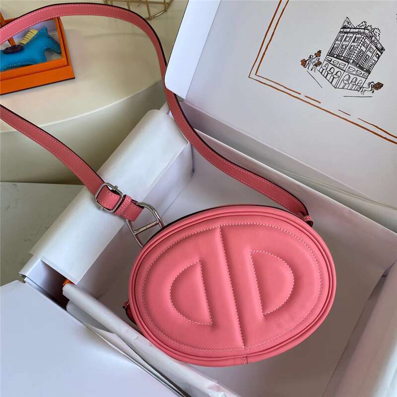 Swift cowhide nose new oval shaped mobile phone one shoulder crossbody chest bag genuine leather female pig