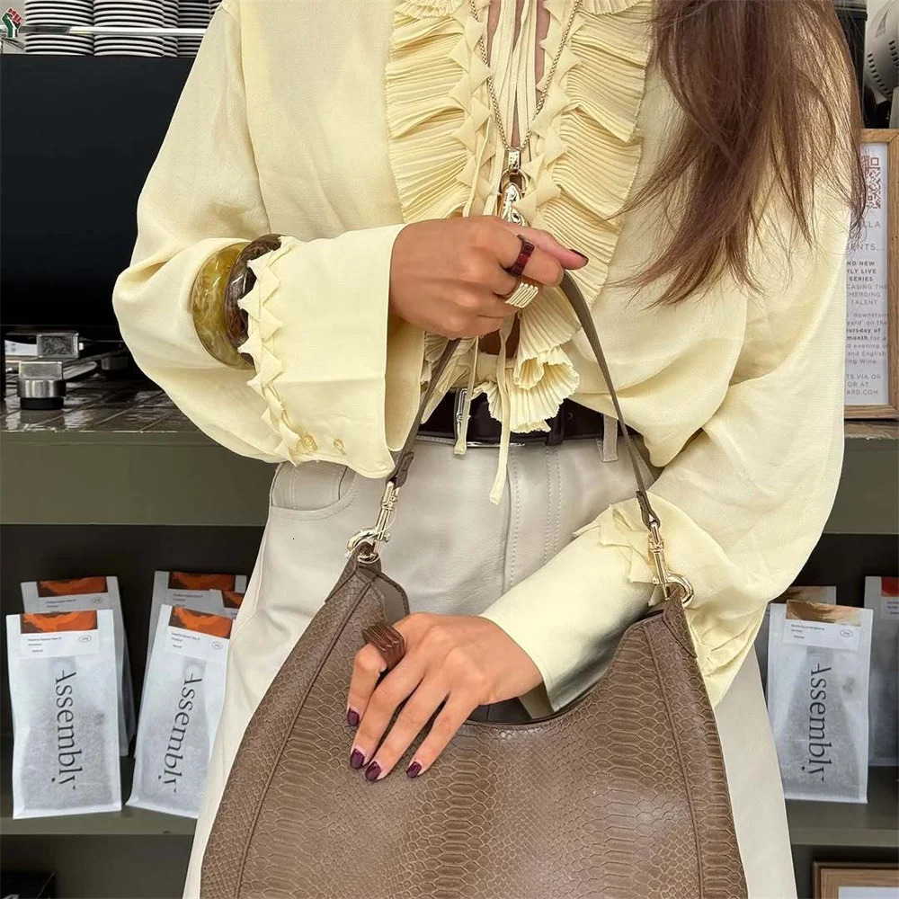 UNIZERA womens versatile solid color long sleeved shirt with ruffled edges and pleated temperament summer style 250520