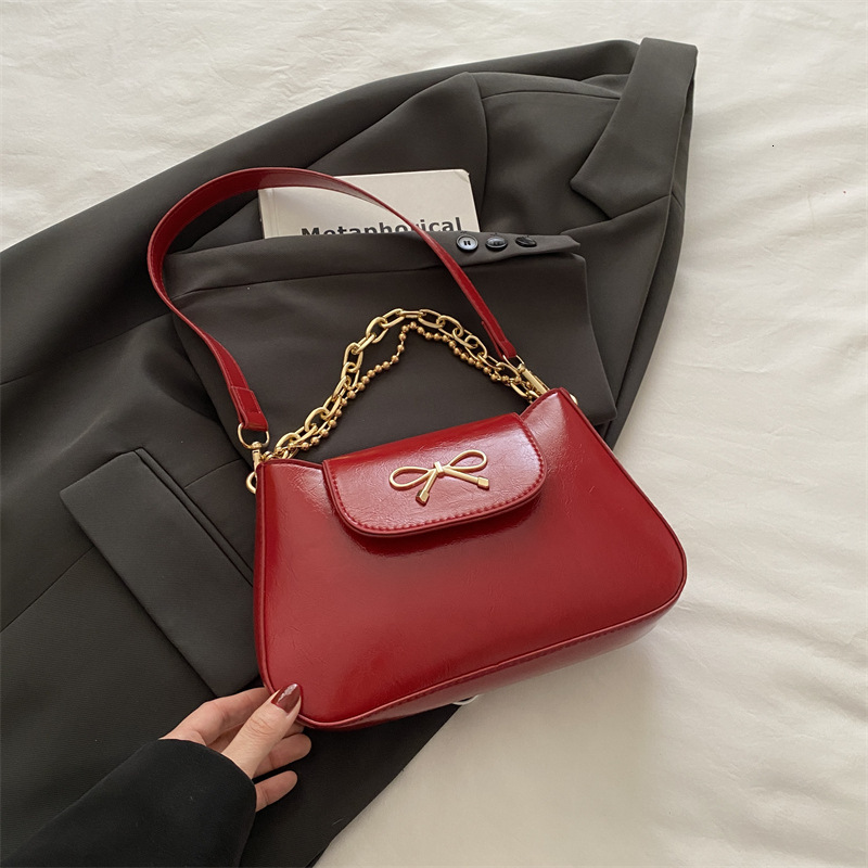 Free Delivery Designer Bag Korean Single Shoulder Chain Hand 2025 Spring New Simple And Versatile Commuting With Bow Decoration Crossbody Luxury