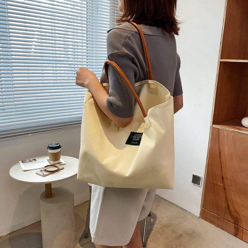 Free Delivery Designer Bag Spring New 2025 Stylish Casual Canvas Shoulder Ins Simple And Artistic Hand Held Trendy Tote Luxury Bag