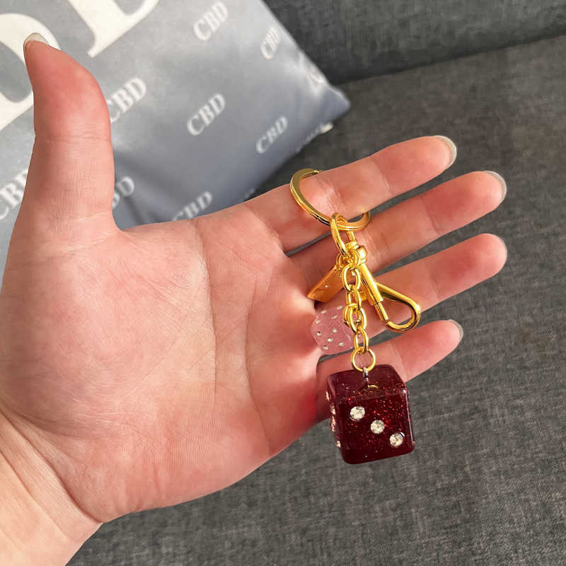Good luck dice, keychain, glitter powder, diamond inlaid resin pendant, ladies' gift, fashionable shoulder bag decoration