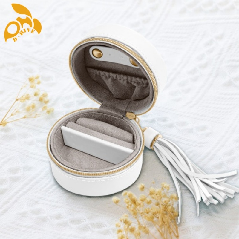 Free delivery. We offer free round portable blue and black cosmetic cases custom-made by fashion designers in high-quality light beige