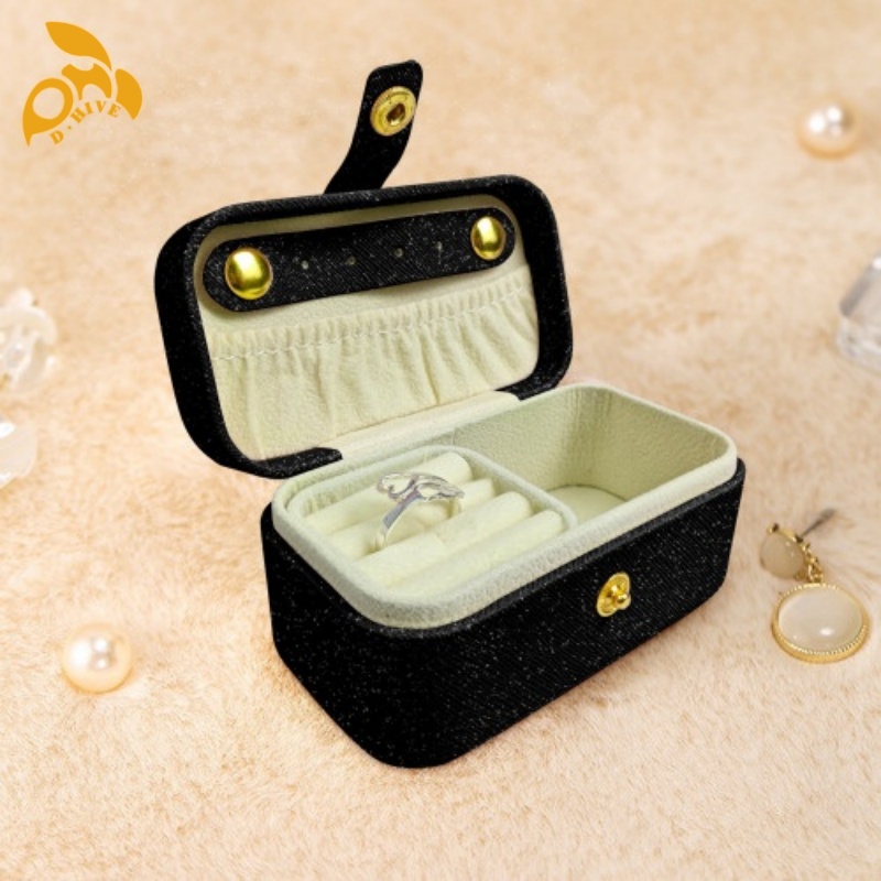 Free delivery. We offer free portable jewelry boxes in high-quality light beige, white and black custom-made by designers