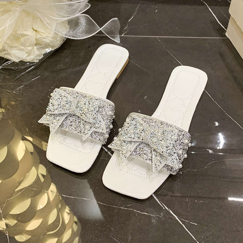 High quality one-piece slippers, female designer sandals, summer 2025 new butterfly knot sandals, light luxury outdoor beach slippers