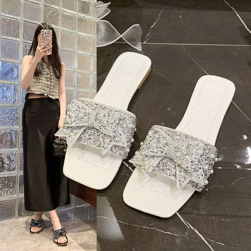 High quality one-piece slippers, female designer sandals, summer 2025 new butterfly knot sandals, light luxury outdoor beach slippers