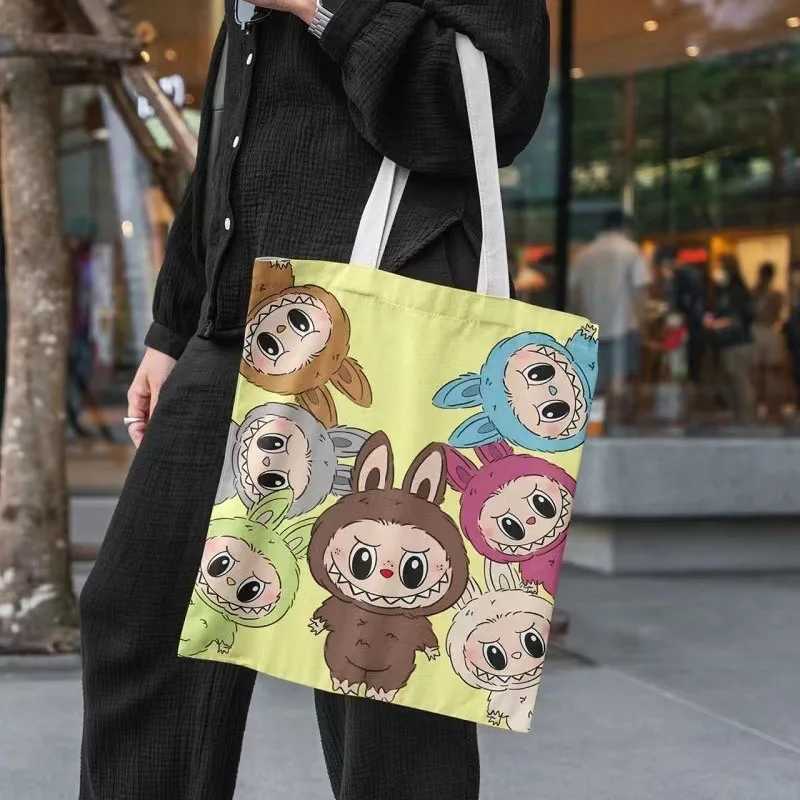 Labubu Canvas Bag Cute Cartoon Shopping Handbag For Women Student Portable Canvas Makeup Shopping Storage Bag Birthday GiftXJ250521