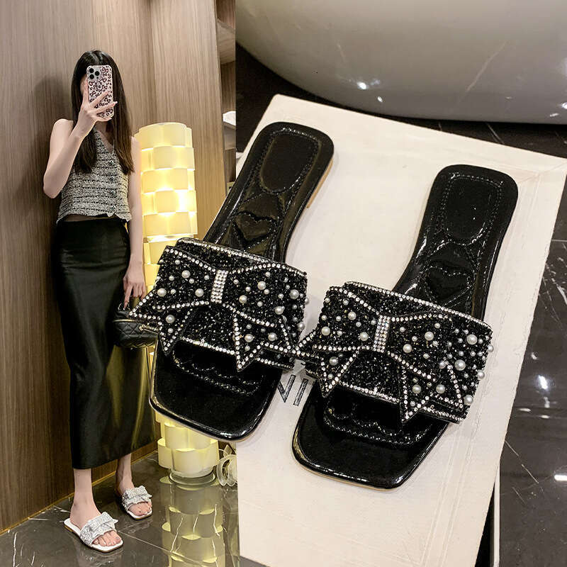 High quality one-piece slippers, female designer sandals, summer 2025 new butterfly knot sandals, light luxury outdoor beach slippers