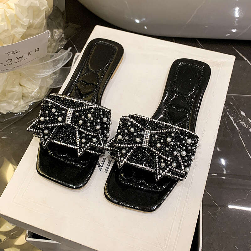 High quality one-piece slippers, female designer sandals, summer 2025 new butterfly knot sandals, light luxury outdoor beach slippers