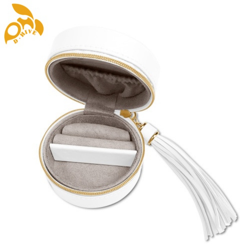 Free delivery. We offer free round portable blue and black cosmetic cases custom-made by fashion designers in high-quality light beige