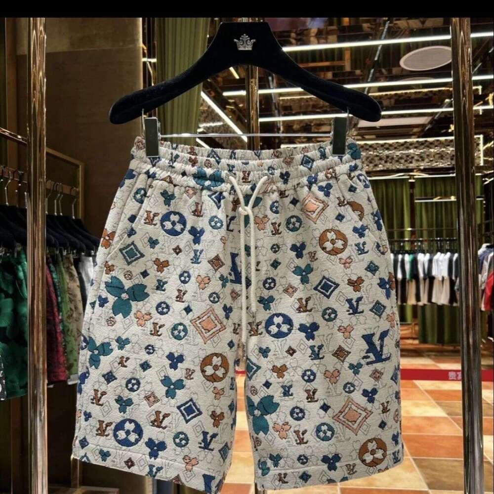 Summer light luxury new loose and fashionable men's quarter shorts sports trend thin beach casual plus size