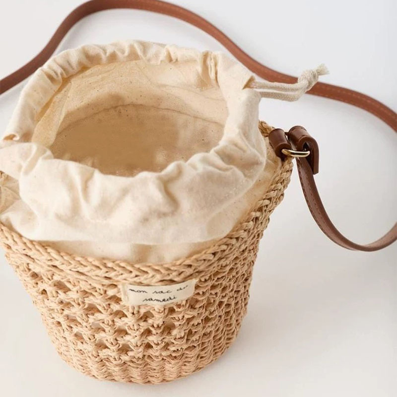 New Cute Bucket Bag Straw Weaving New Small Fresh Hollow One Shoulder Weaving Vacation Beach Bag Women's Bag Outward Travel Bag Retro Designer Ve
