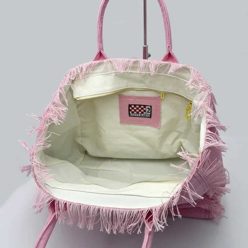 Light Luxury New Womens Large Capacity Tote Bag Fashion Comfortable Casual Travel Canvas Bag Striped Handmade Tassel Handbag W250522