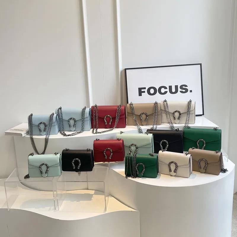 Free shipping fashion light luxury leather chain sling clamshell delicate small square bag solid color shoulder crossbody bag Europe and the United St