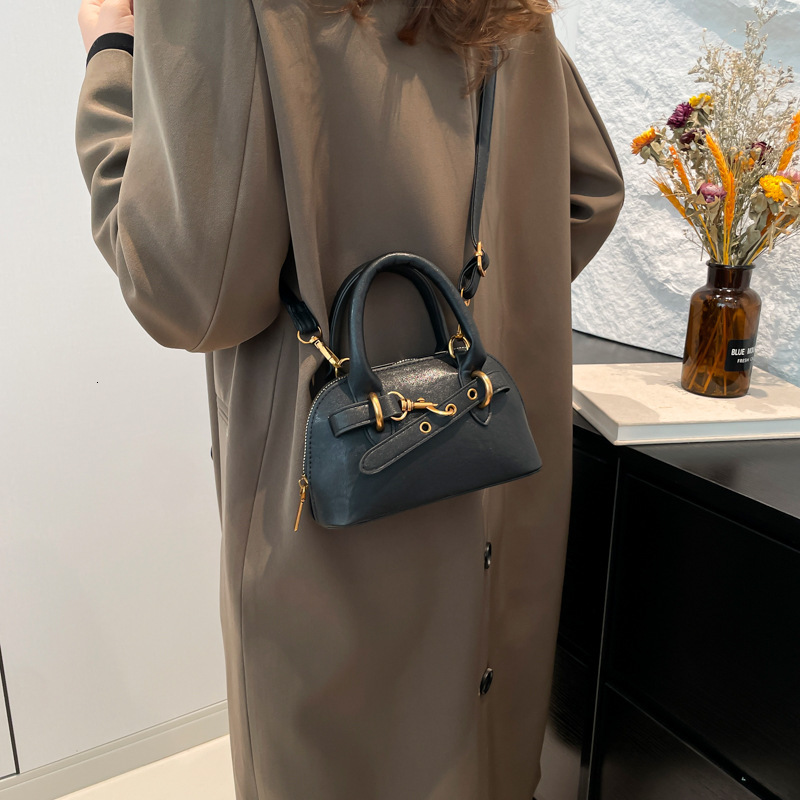 2025 New Outdoor Style Luxury Free Delivery Designer Bag Super Popular Hand-held Shell Small For Girls Light Luxury High-end Feeling Bowling Tote Cros