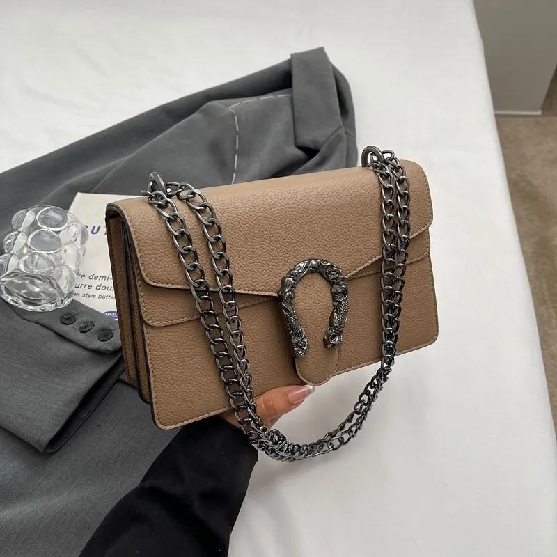 Free shipping fashion light luxury leather chain sling clamshell delicate small square bag solid color shoulder crossbody bag Europe and the United St