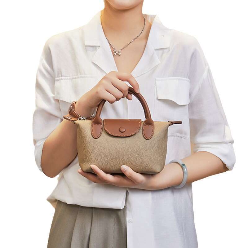 New handbag leather shoulder 2024 spring/summer dumpling diagonal cross women's top layer cowhide small bag
