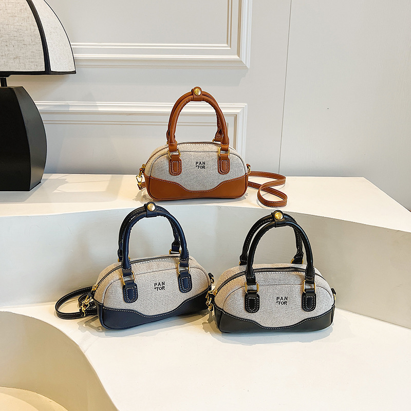 2025 New Outdoor Style Luxury Free Delivery Designer Bag Color Blocking Small Bowling Bag Niche Design Simple Commuting Boston Single Shoulder Pillow 