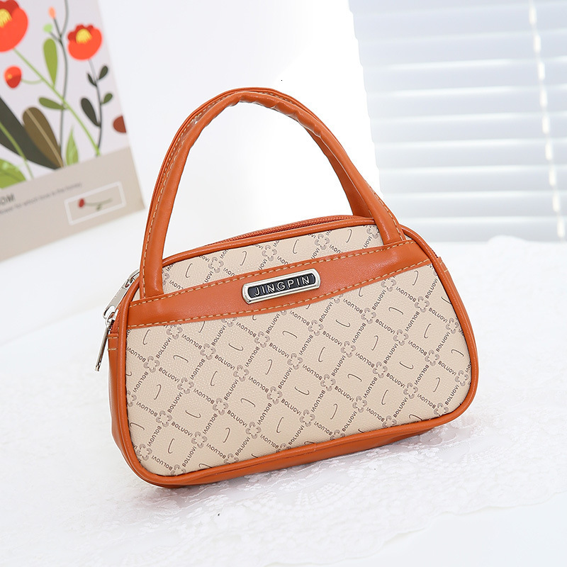 2025 New Outdoor Style Luxury Free Delivery Designer Bag Mom's New Handbag Elderly Phone Bag Middle Aged Handheld Bag