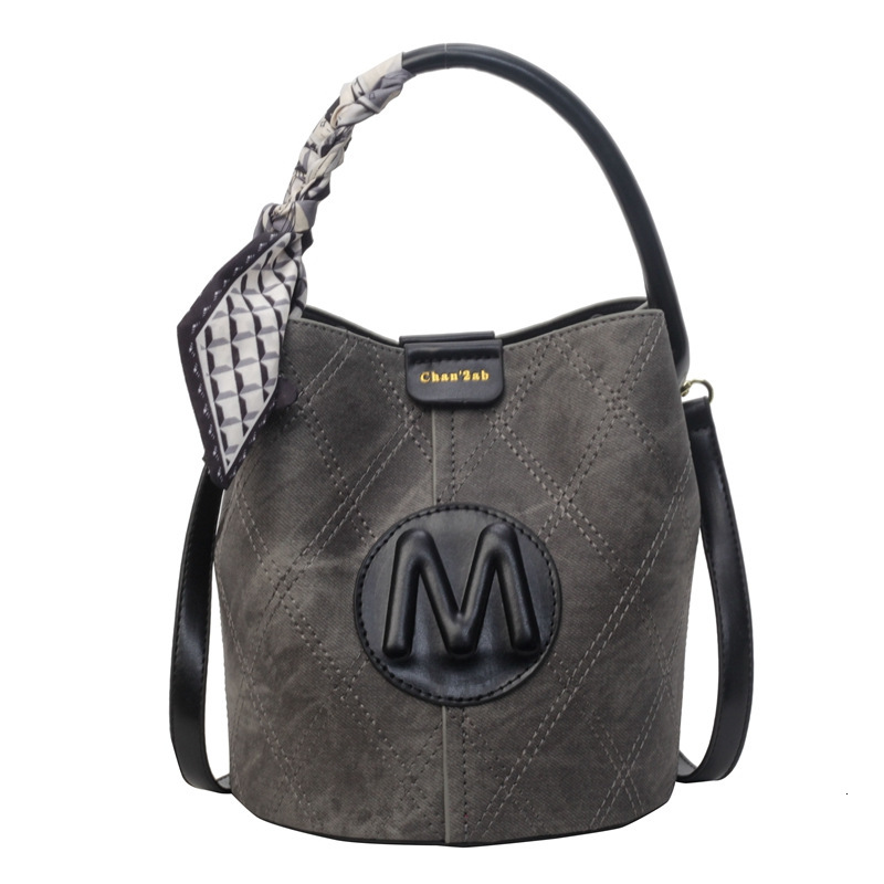 2025 New outdoor style luxury free delivery Designer Bag texture hand-held bucket fashionable casual splicing small bag niche design single shoulder c