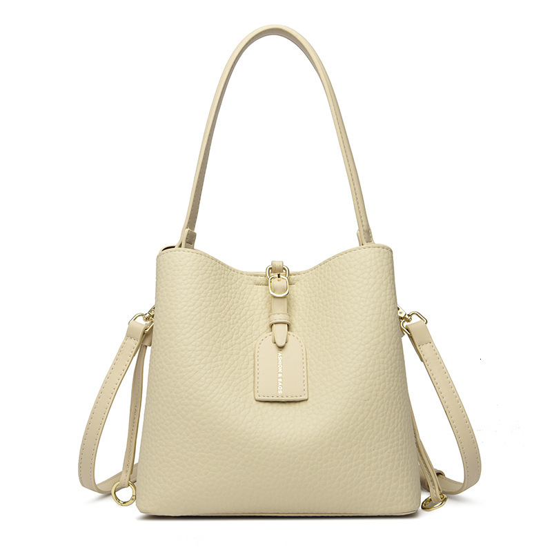 Free Shipping Designer Women's Bag New Fashion Multifunctional Large Capacity Crossbody Bag Simple Commuting Bucket Bag Handbag