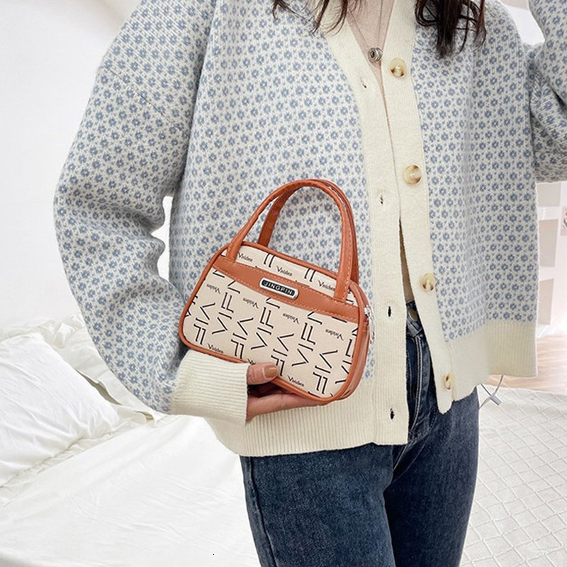 2025 New Outdoor Style Luxury Free Delivery Designer Bag Mom's New Handbag Elderly Phone Bag Middle Aged Handheld Bag